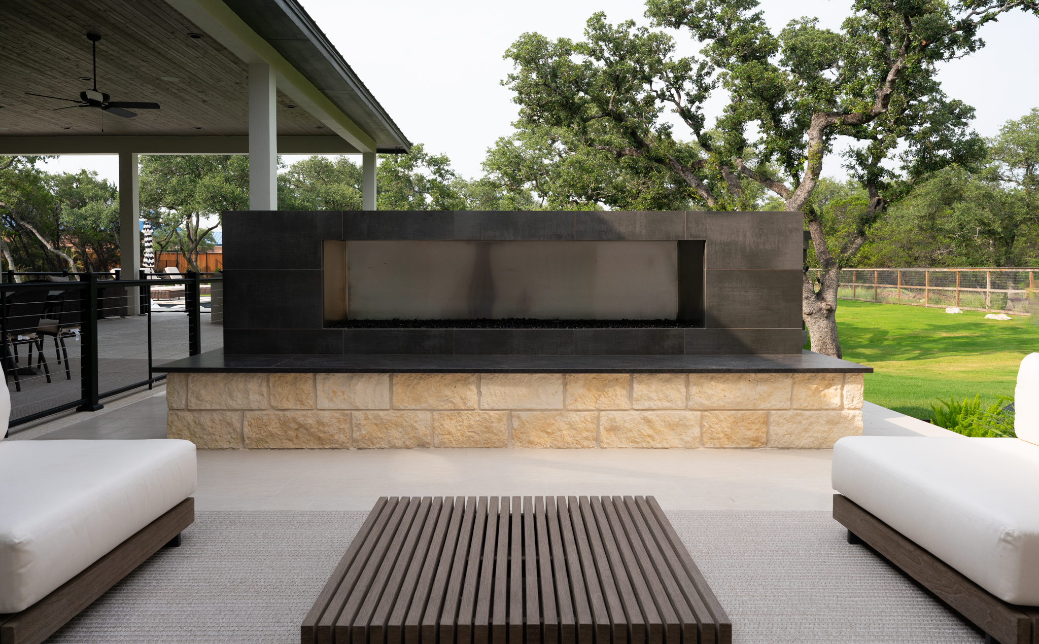 Front-on view of the completed outdoor fireplace and seating area